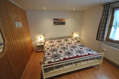 Ein Bett oder Betten in einem Zimmer der Unterkunft Ferienhaus Seeadler