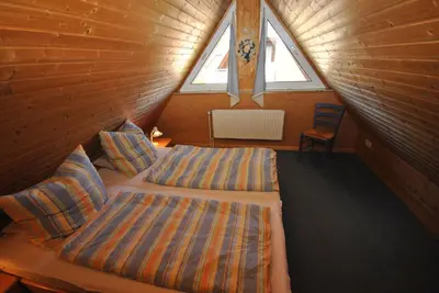 Ein Bett oder Betten in einem Zimmer der Unterkunft Ferienhaus Sonnentau