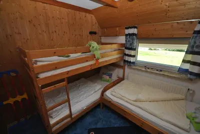 Ein Bett oder Betten in einem Zimmer der Unterkunft Ferienhaus Sonnentau