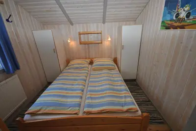 Ein Bett oder Betten in einem Zimmer der Unterkunft Ferienhaus Korsör