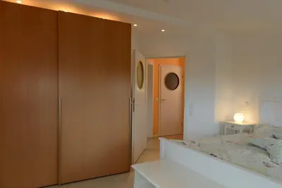 Ein Bett oder Betten in einem Zimmer der Unterkunft Penthouse Medemspeicher