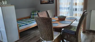 Ein Bett oder Betten in einem Zimmer der Unterkunft Ferienwohnung Schwiemann, Obergeschoss