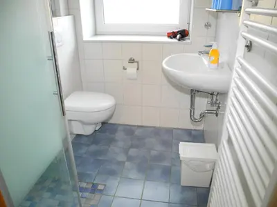 Ein Badezimmer in der Unterkunft Ferienhaus Krabbe Friedrichskoog, 8 Personen, 3 bzw 4 Schlafzimmer