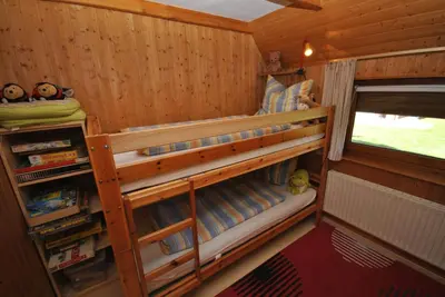 Ein Etagenbett oder Etagenbetten in einem Zimmer der Unterkunft Ferienhaus Sturmtaucher