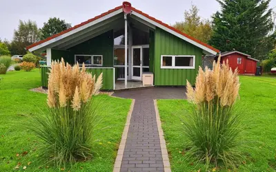 Ein Garten an der Unterkunft Ferienhaus Südsee 26