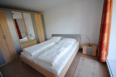 Ein Bett oder Betten in einem Zimmer der Unterkunft Ferienwohnung Korte