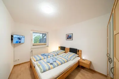 Ein Bett oder Betten in einem Zimmer der Unterkunft Ferienhaus Seestern II