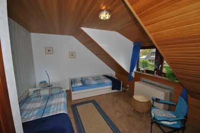 Ein Bett oder Betten in einem Zimmer der Unterkunft Ferienhaus Medemsonne