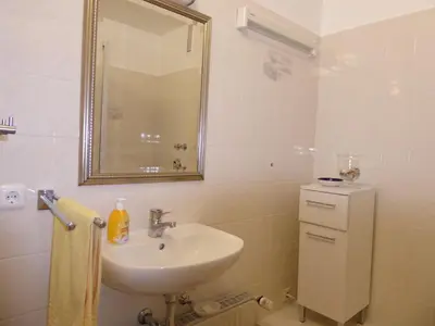 Ein Badezimmer in der Unterkunft Am Sahlenburger Strand - Wohnung 27