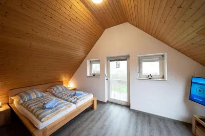 Ein Bett oder Betten in einem Zimmer der Unterkunft Ferienhaus Austernfischer
