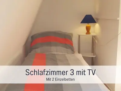 Ein Bett oder Betten in einem Zimmer der Unterkunft Fewos-Bremerhaven, Ferienwohnung 