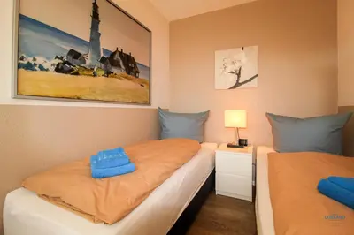 Ein Bett oder Betten in einem Zimmer der Unterkunft Haus Elisebeth Whg. 3
