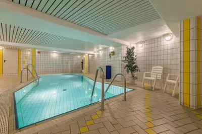 Der Swimmingpool an oder in der Nähe von Residenz Meeresbrandung Wohnung 42