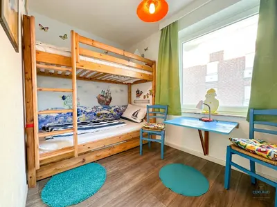 Ein Bett oder Betten in einem Zimmer der Unterkunft Residenz Thalassa Whg. 3