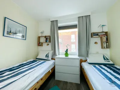 Ein Bett oder Betten in einem Zimmer der Unterkunft Residenz Thalassa Whg. 3