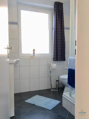 Ein Badezimmer in der Unterkunft Residenz Thalassa Whg. 3