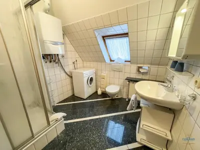 Ein Badezimmer in der Unterkunft Ferienhaus Alter Duhner Weg 7h