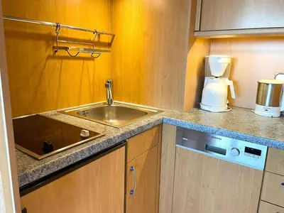 Küche/Küchenzeile in der Unterkunft Strandhochhaus Whg. J12