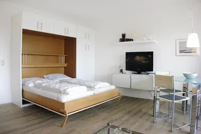 Ein Bett oder Betten in einem Zimmer der Unterkunft Wohnung in Cuxhaven mit einem gemeinsamen Pool
