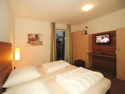 Ein Bett oder Betten in einem Zimmer der Unterkunft Appartement in Cuxhaven