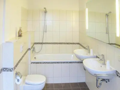 Ein Badezimmer in der Unterkunft Apartment in Cuxhaven