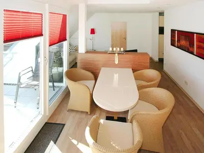 Ein Sitzbereich in der Unterkunft Apartment in Cuxhaven