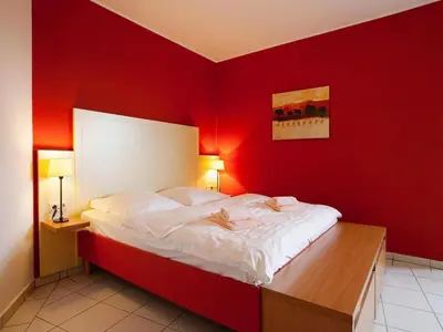Ein Bett oder Betten in einem Zimmer der Unterkunft Apartment in Cuxhaven