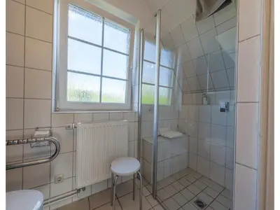 Ein Badezimmer in der Unterkunft Ferienwohnung im EG in Friedrichskoog-Spitze