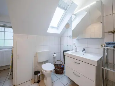 Ein Badezimmer in der Unterkunft Ferienwohnung im OG in Friedrichkoog-Spitze