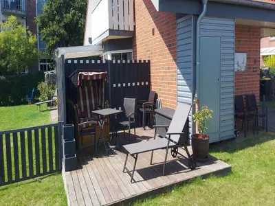 Ein Garten an der Unterkunft Ferienwohnung im OG in Friedrichkoog-Spitze