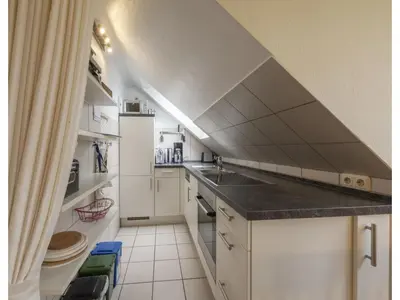 Küche/Küchenzeile in der Unterkunft Ferienwohnung im OG in Friedrichkoog-Spitze