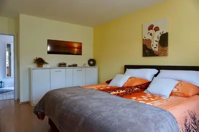 Ein Bett oder Betten in einem Zimmer der Unterkunft Ferienwohnung Wattfischer