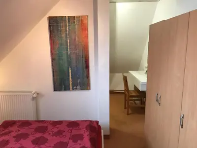Ein Bett oder Betten in einem Zimmer der Unterkunft Ferienwohnung mit Whirlpool