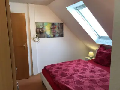 Ein Bett oder Betten in einem Zimmer der Unterkunft Ferienwohnung mit Whirlpool