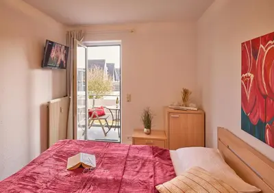 Ein Bett oder Betten in einem Zimmer der Unterkunft Robbenplate, Whng. 7