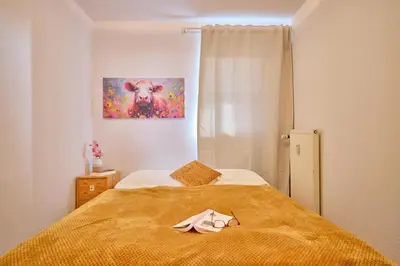 Ein Bett oder Betten in einem Zimmer der Unterkunft Robbenplate, Whng. 7