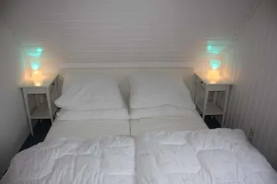 Ein Bett oder Betten in einem Zimmer der Unterkunft Am Ringwall 102