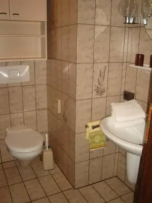 Ein Badezimmer in der Unterkunft Haus Dwarslöper, Ferienwohnung 5