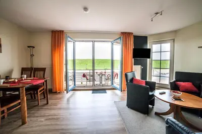 Ein Sitzbereich in der Unterkunft Dünenglück, Ferienwohnung 12