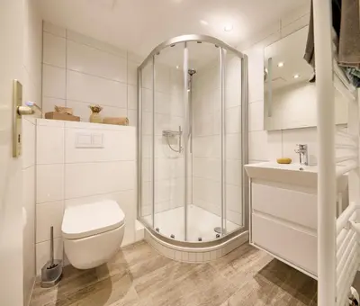 Ein Badezimmer in der Unterkunft Dünenglück, Ferienwohnung 12