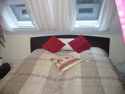 Ein Bett oder Betten in einem Zimmer der Unterkunft Voßhörn 27, Ferienwohnung 4
