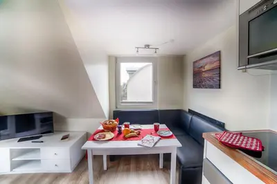 TV/Unterhaltungsangebot in der Unterkunft Dünenglück, Ferienwohnung 33