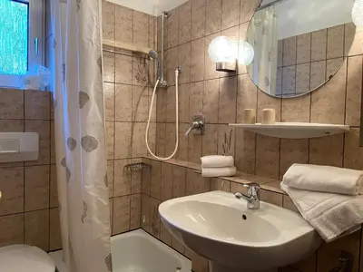 Ein Badezimmer in der Unterkunft Haus Dwarslöper, Ferienwohnung 2