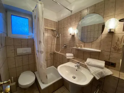 Ein Badezimmer in der Unterkunft Haus Dwarslöper, Ferienwohnung 2