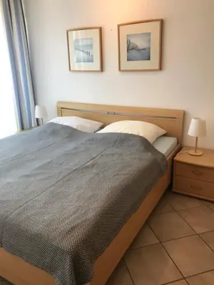 Ein Bett oder Betten in einem Zimmer der Unterkunft Am grooten Steen 1, Ferienwohnung 12