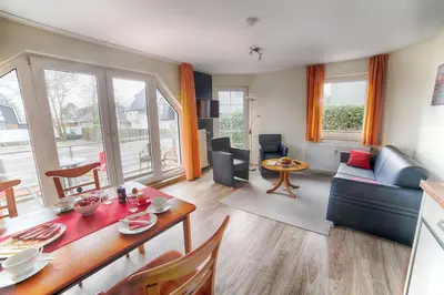 Ein Sitzbereich in der Unterkunft Dünenglück, Ferienwohnung 13