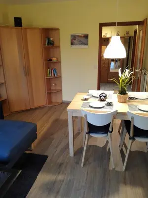 Ein Sitzbereich in der Unterkunft Strandnahe Ferienwohnung Duhnen - Garten, Strandkorb, 4 Personen