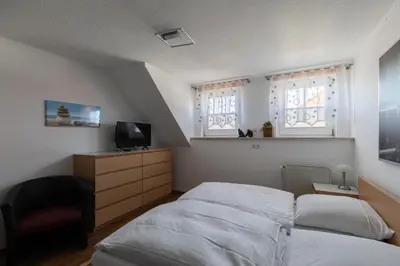 Ein Bett oder Betten in einem Zimmer der Unterkunft Rugenbargsweg 65