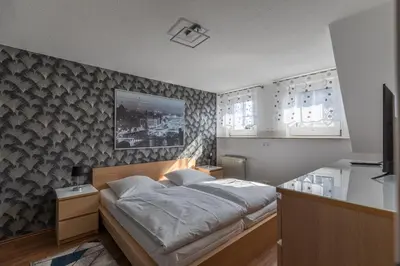 Ein Bett oder Betten in einem Zimmer der Unterkunft Rugenbargsweg 65