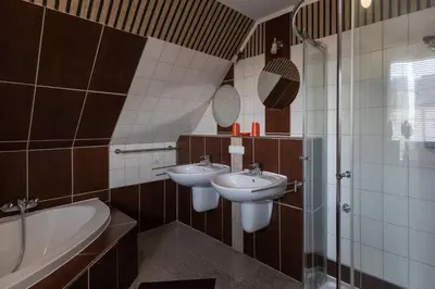 Ein Badezimmer in der Unterkunft Rugenbargsweg 65